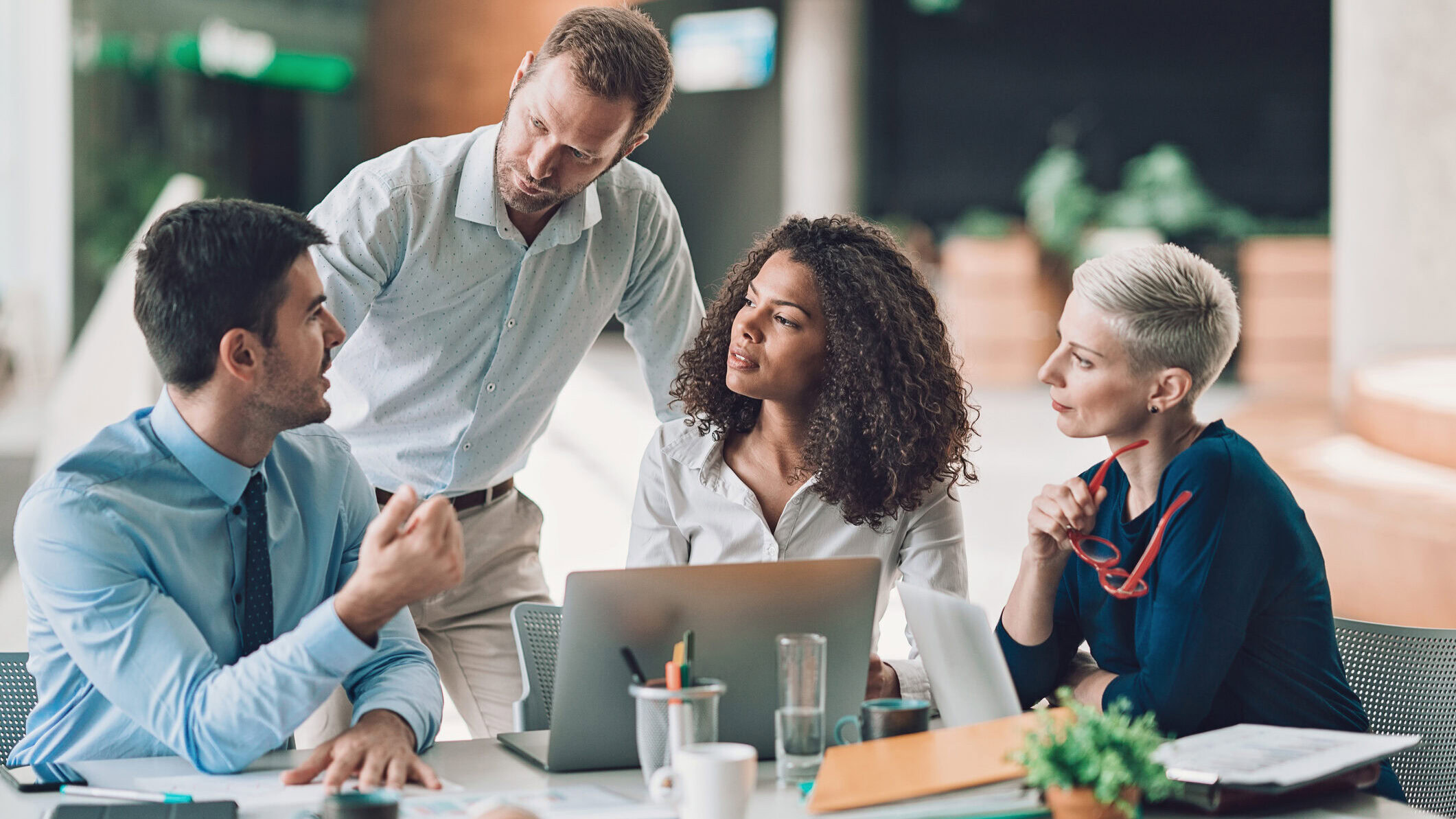 Multi-ethnic group of entrepreneurs discussing business